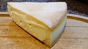 A slice of Stinking Bishop cheese