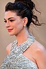 Picture of actress Anne Hathaway smiling at the premiere of The Odyssey in New York