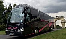Ausden Clark Executive Coach in Black and Pink Livery