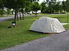 A grey tent set up on Bayou Segnette park grounds