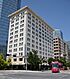 Colcord Hotel in Oklahoma City with streetcar on Robinson Ave (2021).jpg