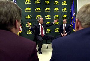 President George W. Bush and John Hoeven meet with area farmers from North Dakota