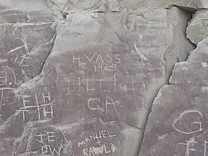 Some of the names on the side of the rock hill