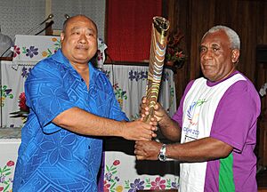 The Governor-General of the Solomon Islands, Sir Frank Kabui receives the Queen`s Baton 2010 Delhi from the Vice President of Commonwealth Games Federation, Oceania Region