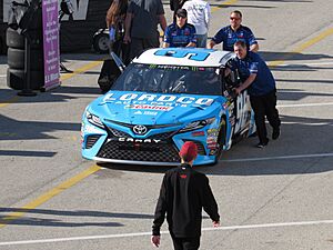 The No. 96 of DJ Kennington being pushed through the garage area at Daytona International Speedway