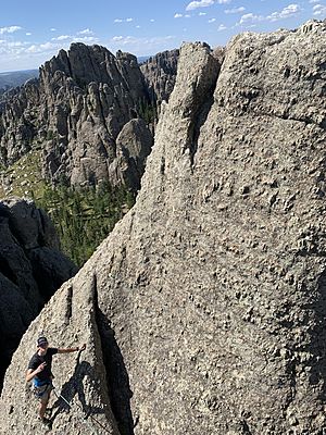 A climber ascends Spire Nine
