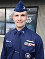 Chief Petty Officer Nick Scheck stands in front of Coast Guard Recruiting Office Atlantic City, New Jersey
