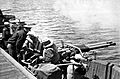 Gunnery practice aboard USS Hollandia (CVE-97), in 1944