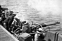 Gunnery practice aboard USS Hollandia (CVE-97), in 1944