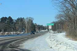 Looking north at the sign for Knowlton on County DB