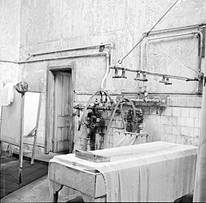 Rotorua Bath House, interior dilapidated view of massage table with body shower, Rotorua