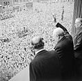 Winston Churchill waves to crowds in Whitehall in London as they celebrate VE Day, 8 May 1945. H41849