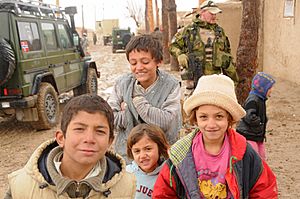 Afghan children and Norwegian forces in Balkh