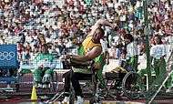 Bruce Wallrodt throwing discus at 1992 Paralympics