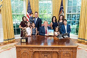 Campos-Duffy introduced a book to Donald Trump