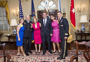 From left, Deanie Dempsey; Chairman of the Joint Chiefs of Staff U.S. Army Gen. Martin E. Dempsey; Stephanie Carter; Deputy Secretary of Defense Ash Carter; Lori Flynn; and Army Gen. Michael T. Flynn 130611-D-HU462-039