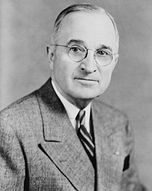 Harry S Truman, bw half-length photo portrait, facing front, 1945-crop