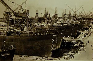 Liberty ships- Machinery and cargo-handling equipment being installed, WWII (23192270331)