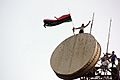 Libyan flag above the communications tower in Al Bayda (Libya, 2011-07-17)