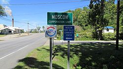 Moscow corporation limit sign with William H. Zimmer Power Station in the background.