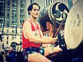 Ondekoza member Marco Lienhard playing Taiko at finish line of the Boston Marathon upon completing the run