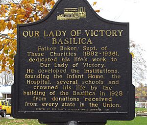 Our Lady of Victory Institutions Sign