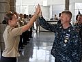 US Navy 110804-N-DR144-456 Master Chief Petty Officer of the Navy (MCPON) Rick D. West high fives Commander, Naval Surface Force U.S. Pacific Fleet