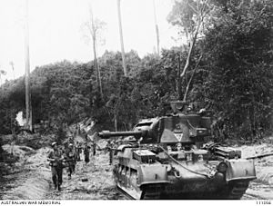 2 10th Aust Infantry Battalion advance with Matilda frog flamethrower Balikpapan