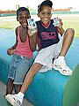 Children Brandish Baseball Cards at Stadium - San Pedro de Macoris - Dominican Republic