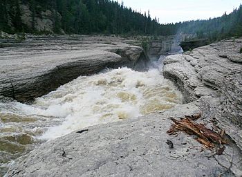 Trout River rapids close to Sambaa Deh Falls Mackenzie Highway, NWT.jpg