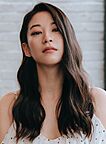 Headshot of Arden Cho looking straight at the camera.