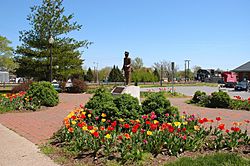 This statue was placed here by Station Carbondale, Inc. through donations from people dedicated to the preservation of Carbondale's railroad history. The first train came to Carbondale on July 4, 1854.  At the peak of the city's railroad traffic, as many as 53 passenger trains passed through here each day.