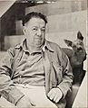 Diego Rivera with a xoloitzcuintle dog in the Blue House, Coyoacan - Google Art Project