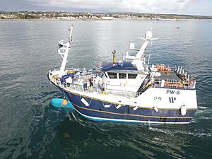 Fishing Boat coming into Newlyn Harbour by Kernow Skies