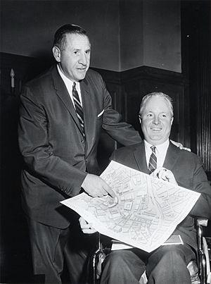 Governor Foster Furcolo and Mayor John F. Collins hold the plans for Government Center (12618490703) (1)