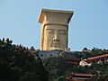 Large statue on hilltop at Fengdu Ghost City
