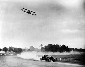 Lincoln Beachey and Barney Oldfield racing cph.3b18665