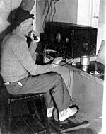 Pedal radio being used in South Solitary Island lighthouse, to communicate with Norah Head Lightstation, 1946