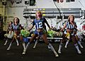 US Navy 120213-N-KD852-106 The Seattle Seahawks cheerleaders, the Sea Gals, perform for Sailors and Marines aboard the amphibious assault ship USS