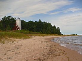 Forty Mile Point Light along the shores of Lake Huron within Rogers Township