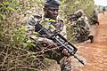 A Cameroon soldier provides security during a patrol as part of a culmination exercise of infantry squad tactics March 18, 2014, during Central Accord 14 in Koutaba, Cameroon 140318-A-IS772-025
