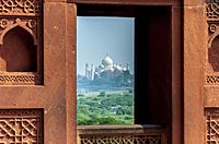 A window view of Taj Mahal from Agra Fort