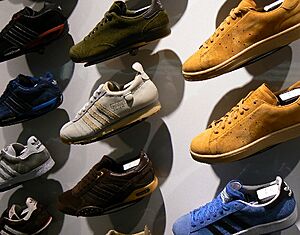 Adidas sneakers display - several left shoes