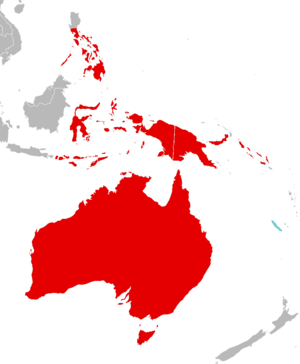 Map showing southeastern Asia, Australia, Melanesia, and New Zealand. Islands in the Philippines and eastern Indonesia are colored red, east to the Solomon Islands, as is Australia with Tasmania. New Caledonia is colored blue.