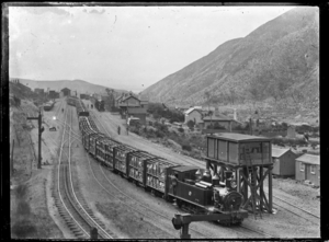 Cross Creek station railway yards, with long goods train carrying sheep. ATLIB 274561