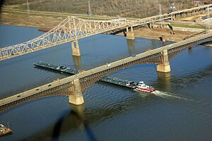 Gfp-missouri-st-louis-boat-under-bridge