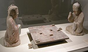 Met, Earthenware figures playing liubo, Han Dynasty