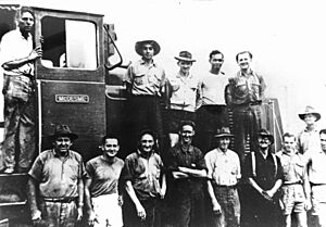 Pioneer Mill tramway operations workers with locomotive McDesme