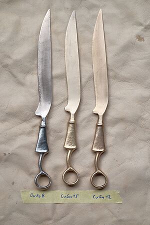 Reproductions of bronze age knives made from arsenic and tin bronze