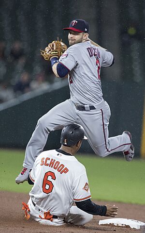 Second baseman Brian Dozier trying to turn double play